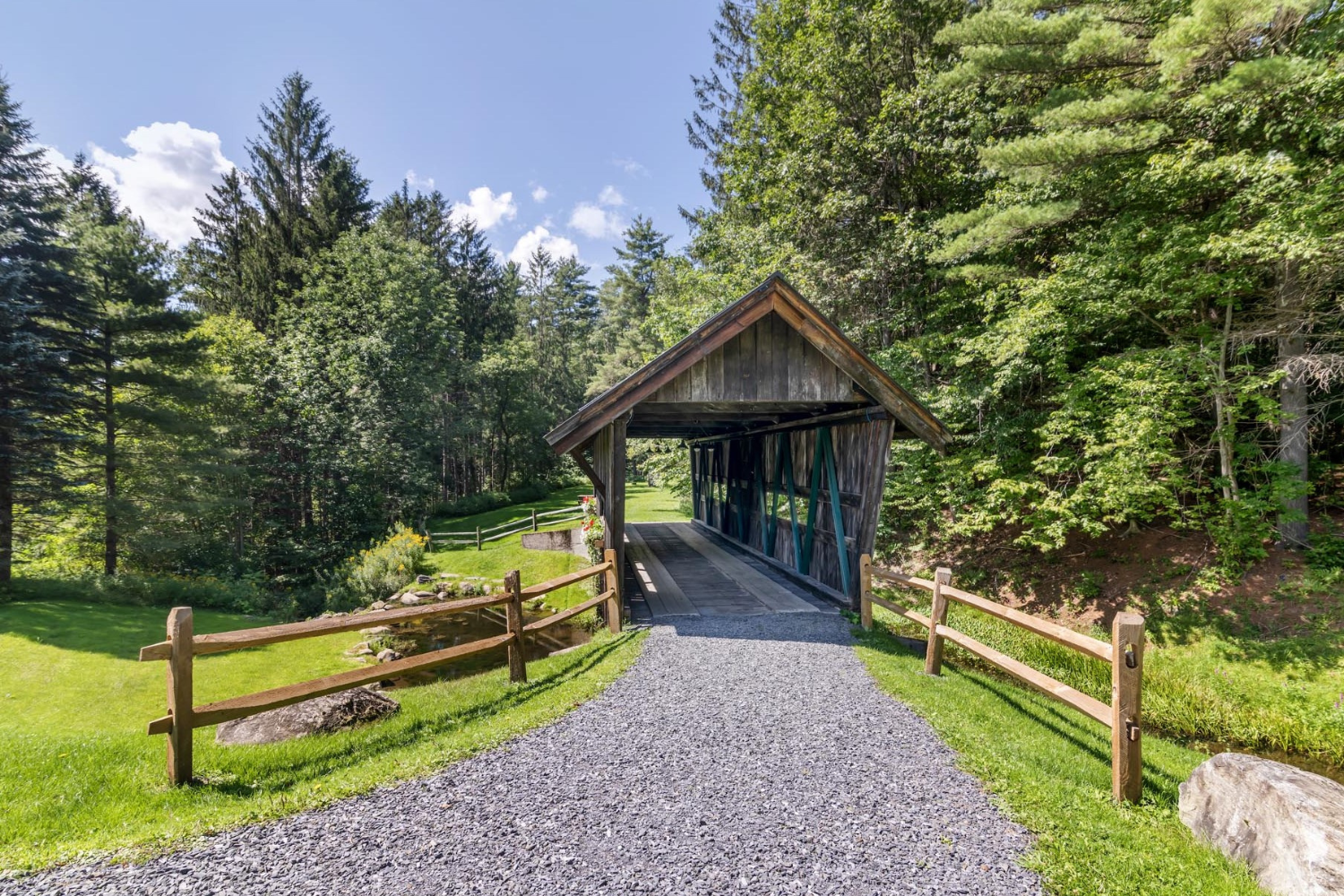 A covered bridge on the Best Western Plus property